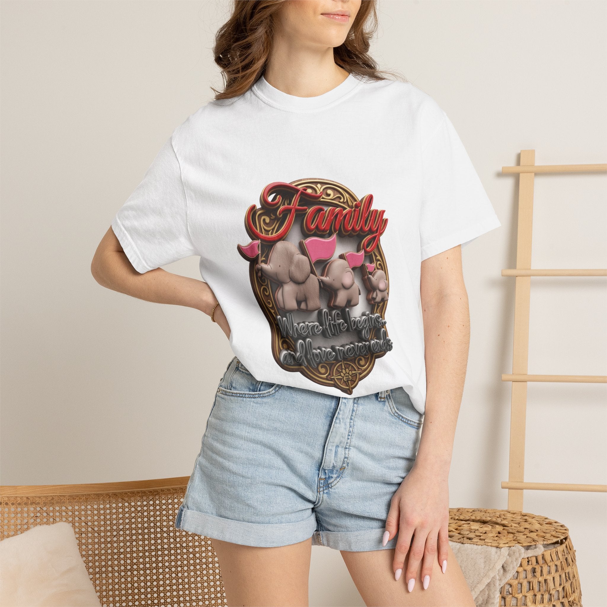 Woman wearing the white elephant family t-shirt with denim shorts