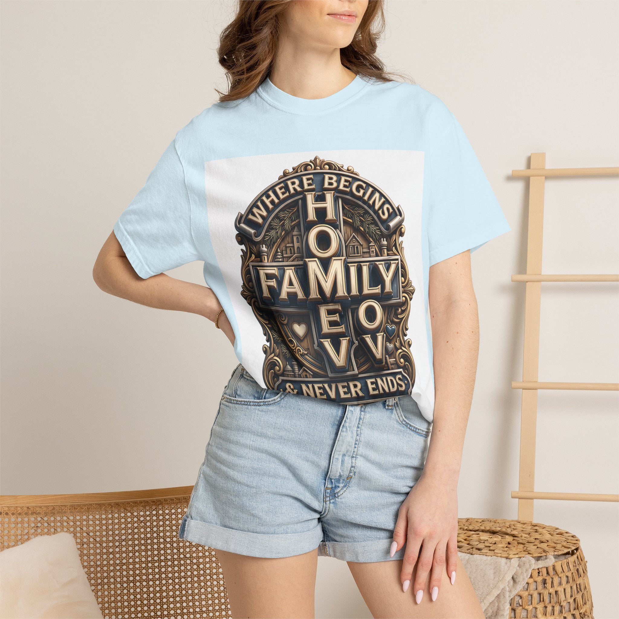 Woman wearing the Chambray pale blue home family love crest t-shirt with denim shorts