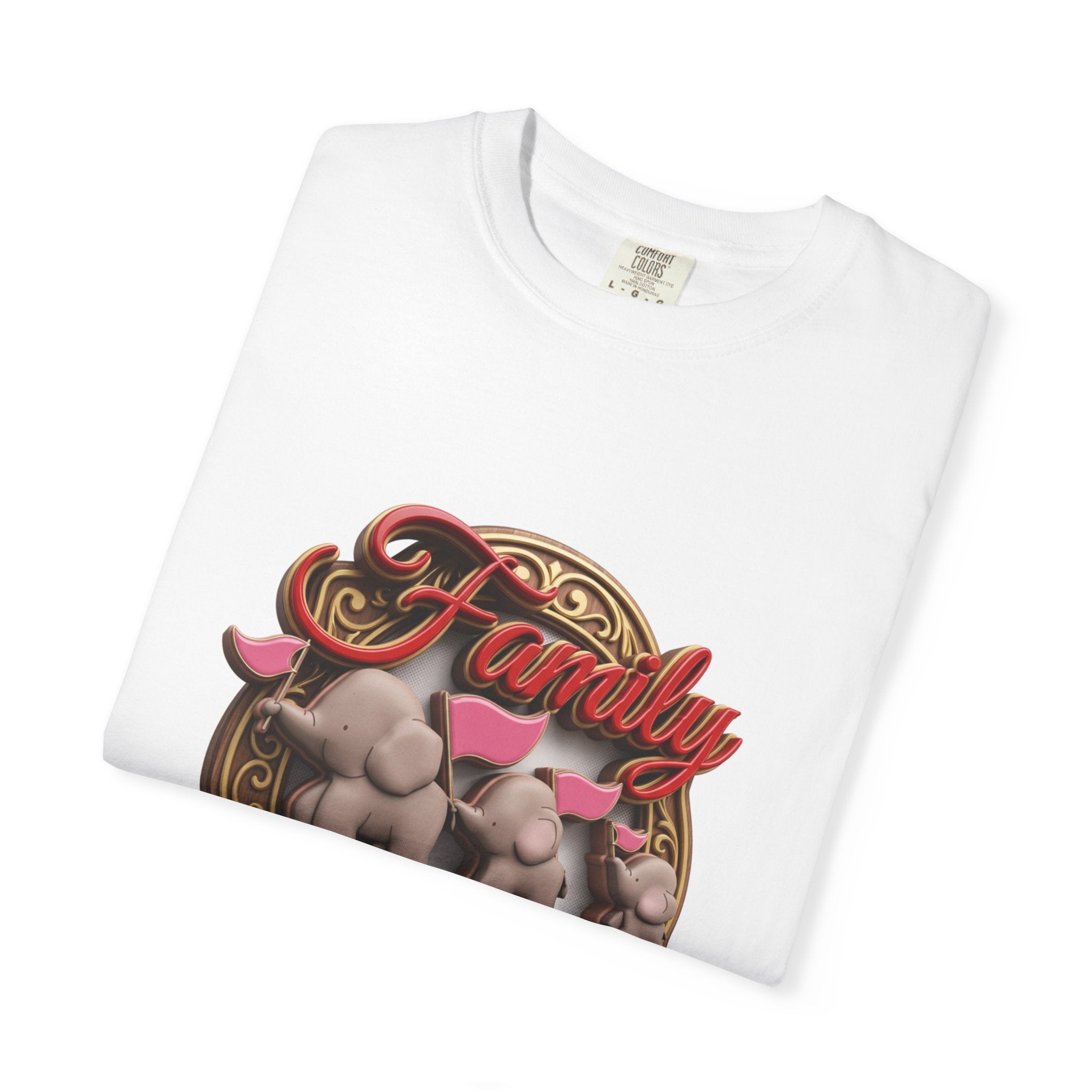 White t-shirt folded to show the elephant family print and the garment-dyed cotton texture