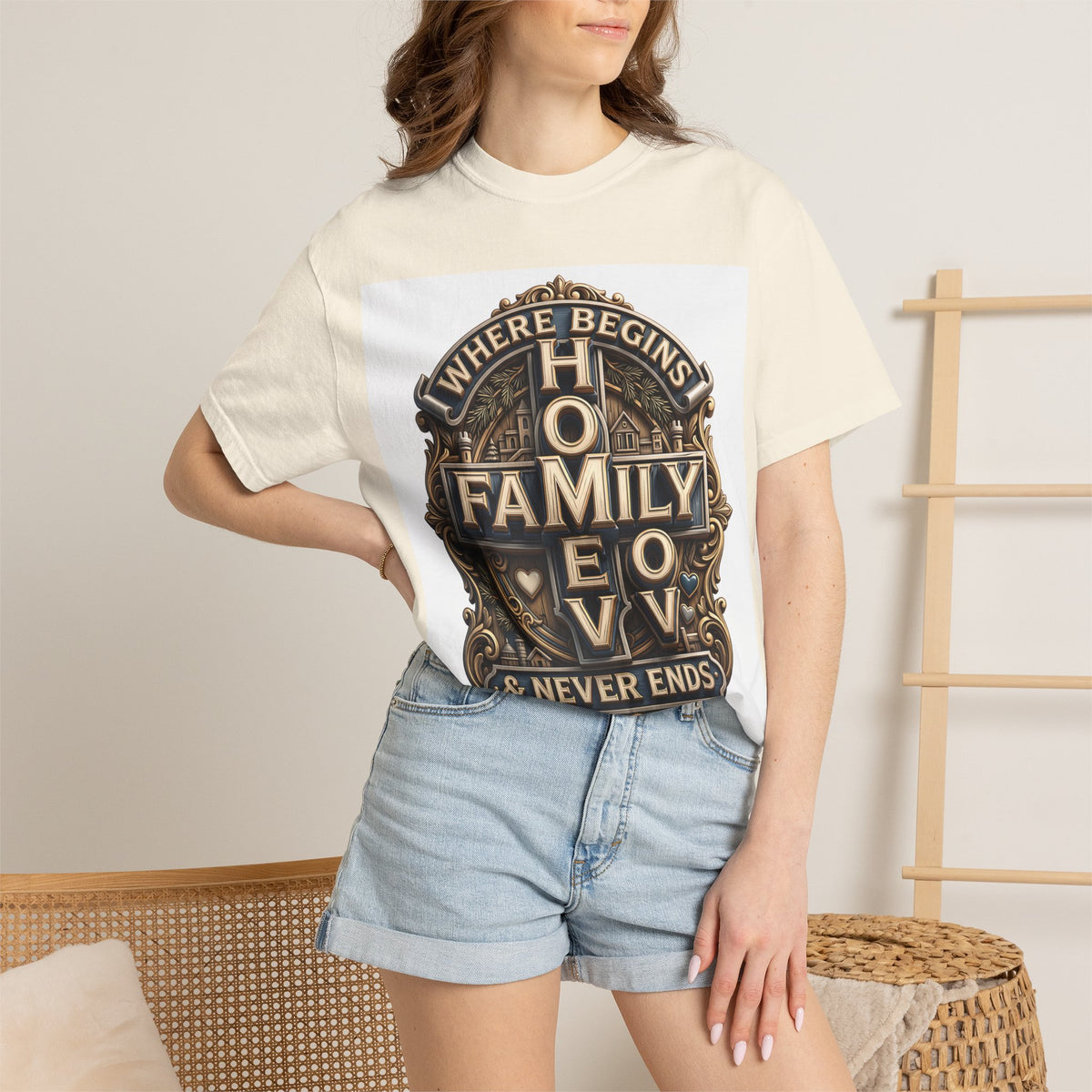 Woman wearing the ivory cream home family love crest t-shirt with denim shorts