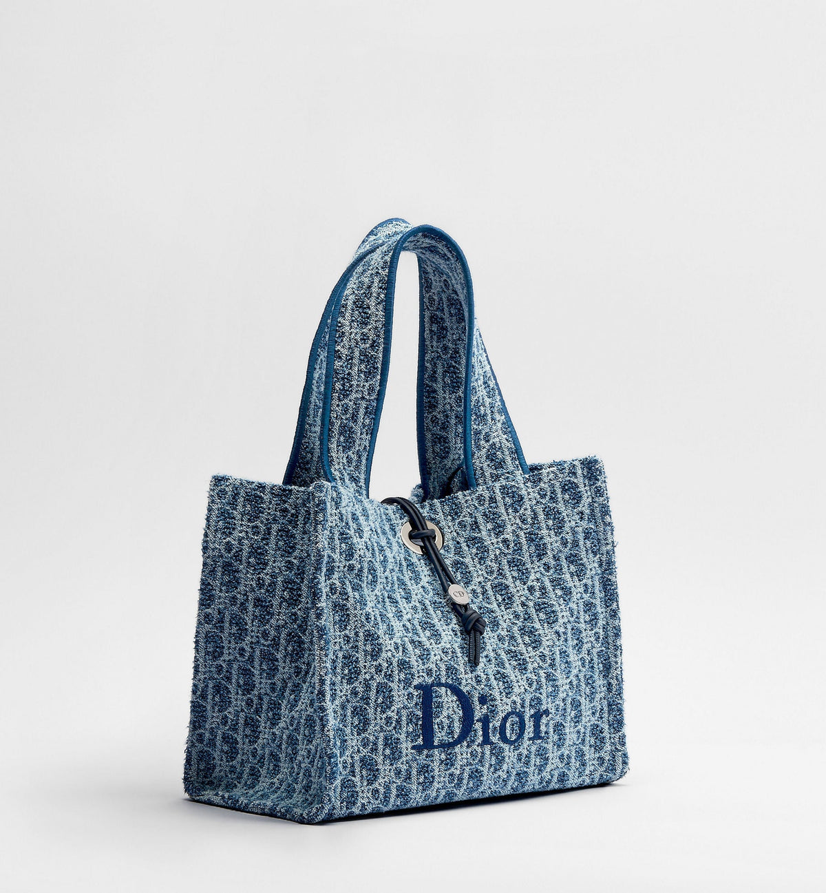 Small Spongy Book Designer Tote Bag With Blue Textured Fabric And Embroidered Signature For Women